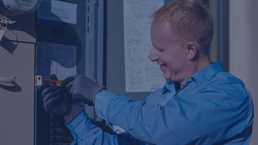 Parker & Sons Recruitment Video: Image is an electrician on the job